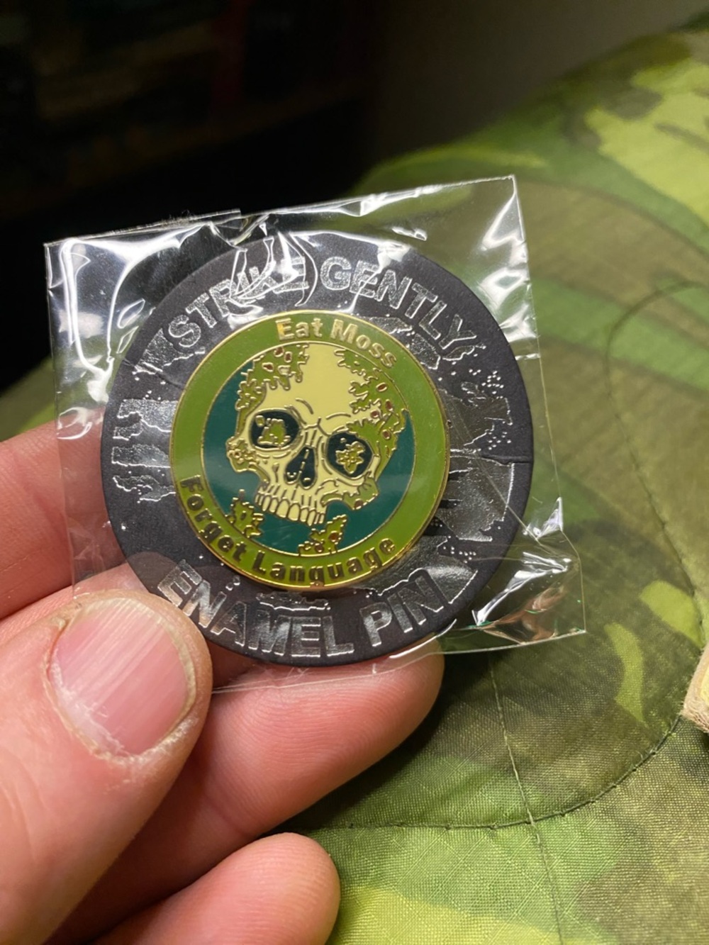 Brand New In Package Strike Gently “Eat Moss, Forget Language” Skull Enamel Pin